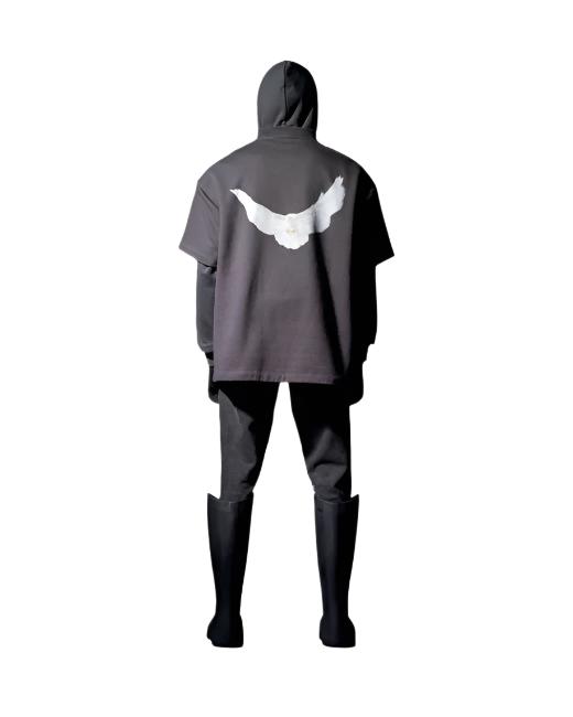 The Yeezy Gap Engineered by Balenciaga Dove Hoodie in Washed Black combines Kanye West's design approach with Balenciaga's high-fashion edge. Crafted from premium heavyweight cotton, the hoodie features a relaxed, oversized fit with a faded black wash for a worn-in look. The standout detail is the iconic dove graphic on the back, symbolizing peace, while subtle Gap and Yeezy branding enhances its exclusivity. This hoodie merges streetwear with luxury, making it a must-have for fans of both Yeezy and Balenci